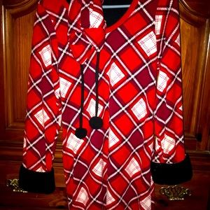 Sleep dress below the knees with a hat.  Fake fur cuffs.